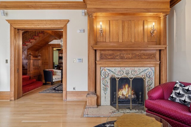 4923 S Greenwood Ave, Chicago, IL 60615 - living room with wood finished floors, stairs, and a high end fireplace