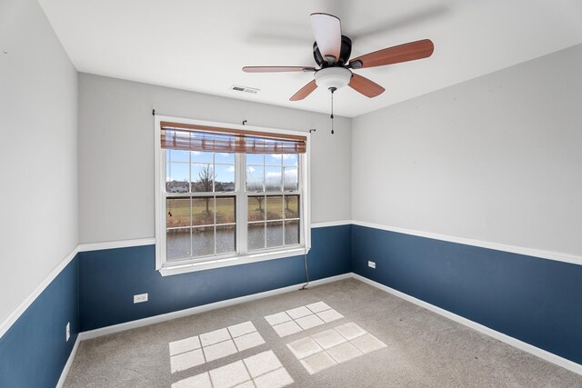 2366 Georgetown Cir, Aurora, IL 60503 - unfurnished room with baseboards, visible vents, ceiling fan, and carpet