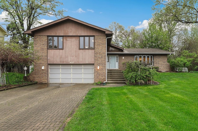 407 Brad Ct, Naperville, IL 60565 - split level home featuring a garage, decorative driveway, a front yard, and brick siding