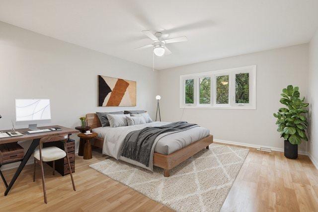 407 Brad Ct, Naperville, IL 60565 - bedroom with light wood finished floors, a desk, baseboards, and ceiling fan