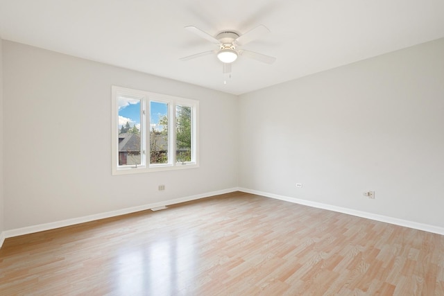 407 Brad Ct, Naperville, IL 60565 - spare room featuring light wood finished floors, ceiling fan, and baseboards