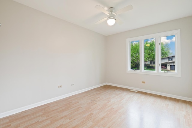 407 Brad Ct, Naperville, IL 60565 - unfurnished room with baseboards, light wood-type flooring, and a ceiling fan