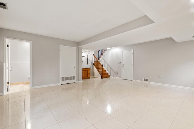407 Brad Ct, Naperville, IL 60565 - unfurnished room with light tile patterned floors, stairway, and baseboards