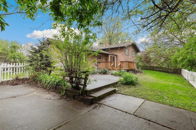 407 Brad Ct, Naperville, IL 60565 - back of property featuring a wooden deck, a chimney, and a patio