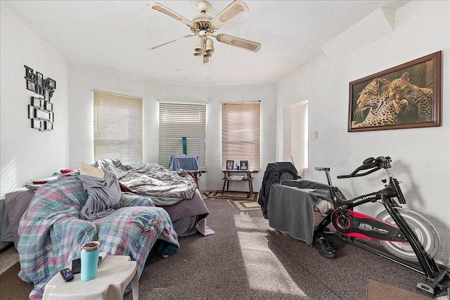 bedroom featuring carpet flooring and a ceiling fan