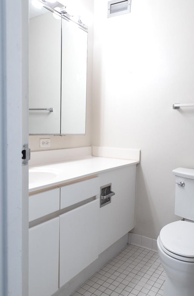 440 N Wabash St Unit 1807, Chicago, IL 60611 - half bath with visible vents, toilet, tile patterned flooring, and vanity