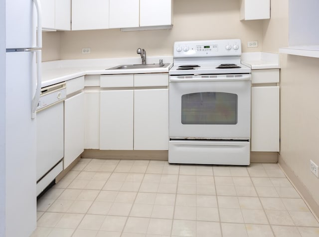 440 N Wabash St Unit 1807, Chicago, IL 60611 - kitchen featuring light countertops, a sink, white cabinetry, and white appliances