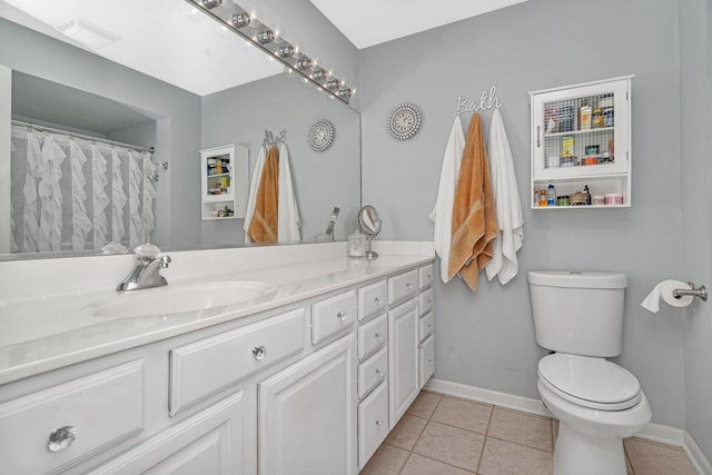 bathroom featuring tile patterned floors, toilet, baseboards, visible vents, and vanity
