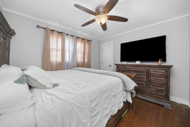 bedroom featuring a closet, crown molding, baseboards, a ceiling fan, and dark wood-type flooring