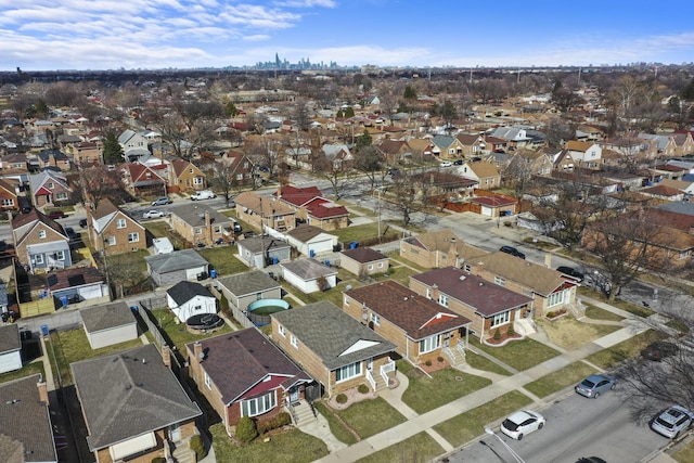 birds eye view of property with a residential view