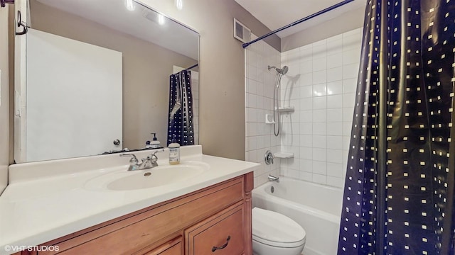full bathroom with visible vents, shower / bath combo with shower curtain, toilet, and vanity