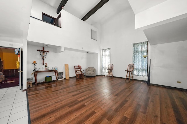 3917 Sunset Ave, Markham, IL 60428 - living room featuring a high ceiling, beamed ceiling, and wood finished floors