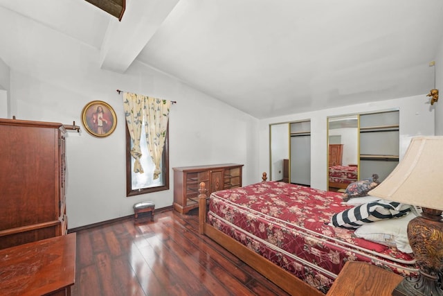 3917 Sunset Ave, Markham, IL 60428 - bedroom with two closets, vaulted ceiling with beams, baseboards, and wood finished floors