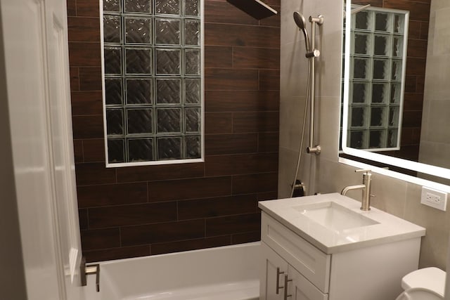 3418 N Nordica Ave, Chicago, IL 60634 - bathroom featuring tub / shower combination, vanity, and toilet