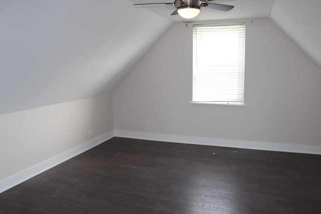 3418 N Nordica Ave, Chicago, IL 60634 - bonus room with baseboards, lofted ceiling, dark wood-type flooring, and a ceiling fan