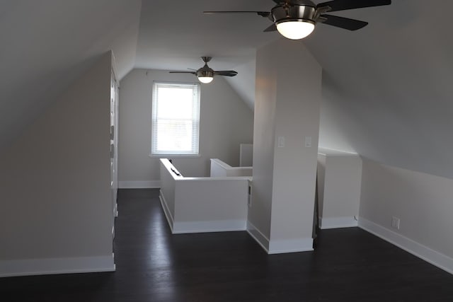 3418 N Nordica Ave, Chicago, IL 60634 - bonus room featuring baseboards, vaulted ceiling, dark wood-type flooring, and a ceiling fan
