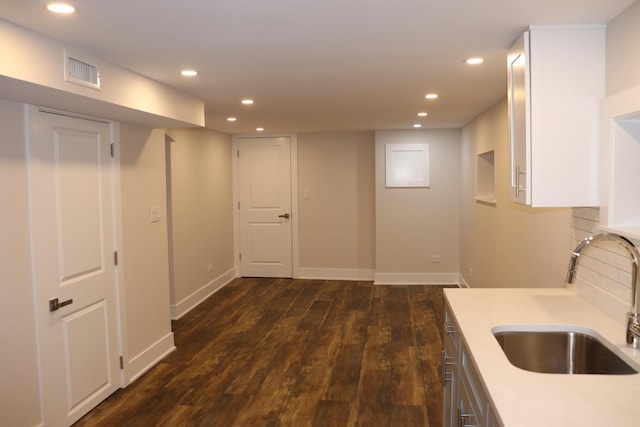 3418 N Nordica Ave, Chicago, IL 60634 - kitchen with light countertops, a sink, visible vents, recessed lighting, and dark wood-style flooring