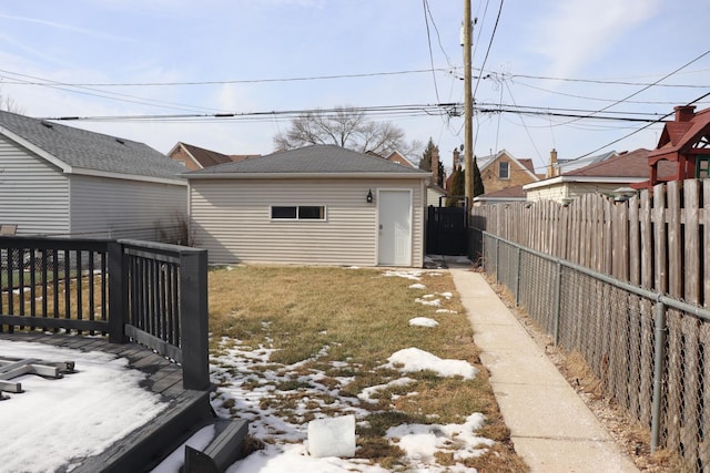 3418 N Nordica Ave, Chicago, IL 60634 - view of yard featuring an outbuilding, a fenced backyard, and a deck