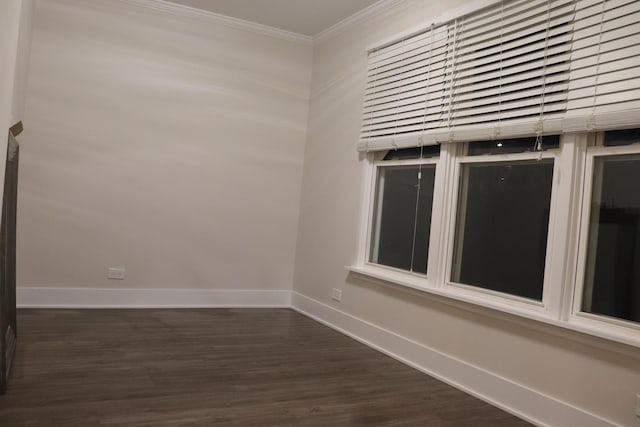 3418 N Nordica Ave, Chicago, IL 60634 - spare room featuring baseboards, dark wood-style flooring, and crown molding