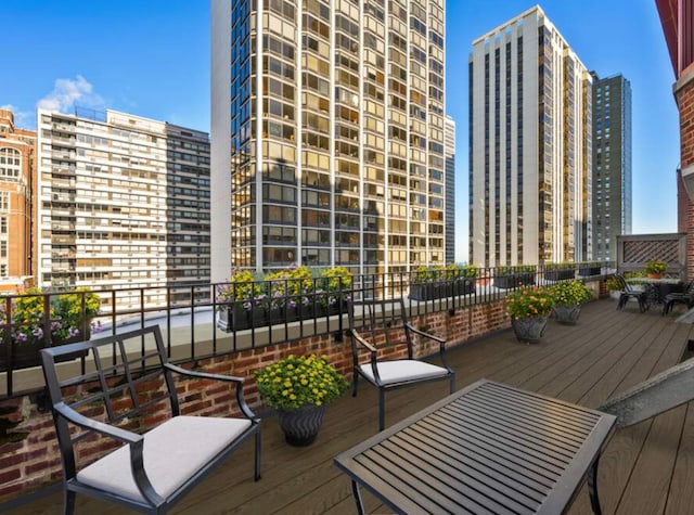 balcony featuring a city view