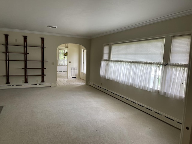 810 13th Ave, Mendota, IL 61342 - carpeted spare room with arched walkways, a baseboard radiator, ornamental molding, a baseboard heating unit, and radiator heating unit