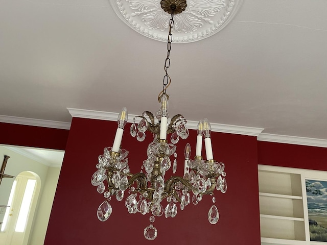 810 13th Ave, Mendota, IL 61342 - detailed view of arched walkways, ornamental molding, and a chandelier