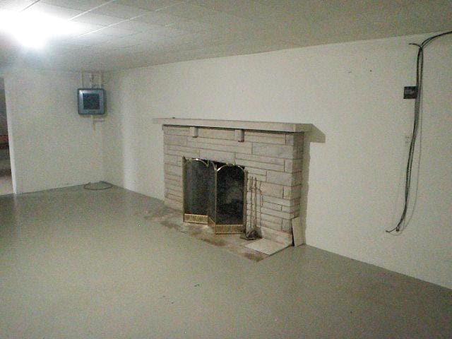 810 13th Ave, Mendota, IL 61342 - below grade area with a fireplace