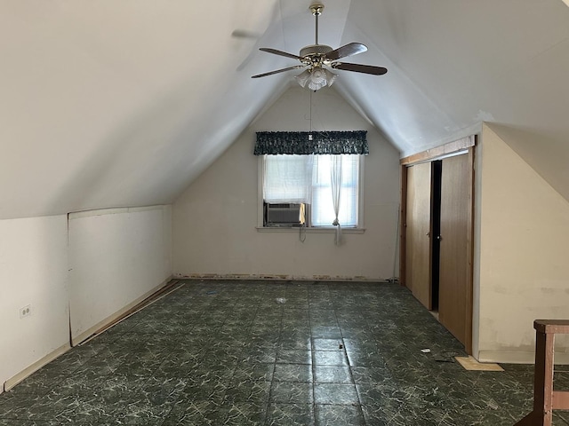 bonus room with cooling unit, lofted ceiling, and ceiling fan