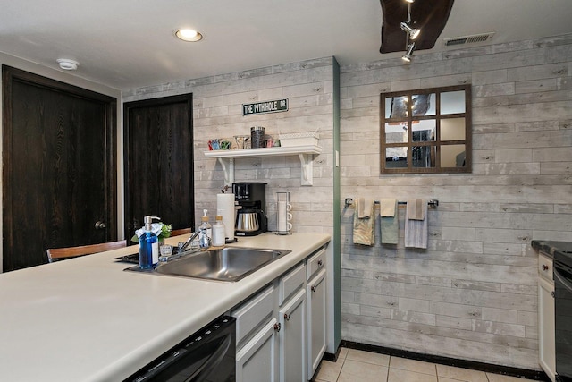 16 Oak Glen Dr, Galena, IL 61036 - kitchen with open shelves, light tile patterned floors, a sink, visible vents, and black dishwasher