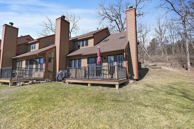 16 Oak Glen Dr, Galena, IL 61036 - back of house with a wooden deck, a lawn, and a chimney