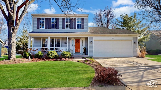 traditional-style house with a porch, a front yard, driveway, and an attached garage