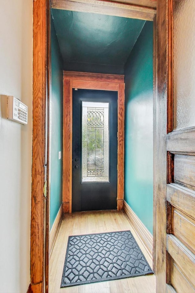 4364 S Oakenwald Ave, Chicago, IL 60653 - doorway to outside with baseboards and wood finished floors