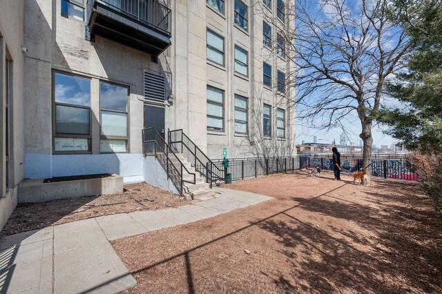 property entrance with fence