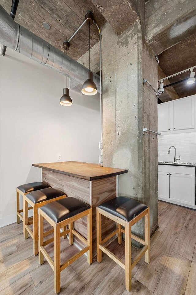 dining space featuring light wood-style flooring