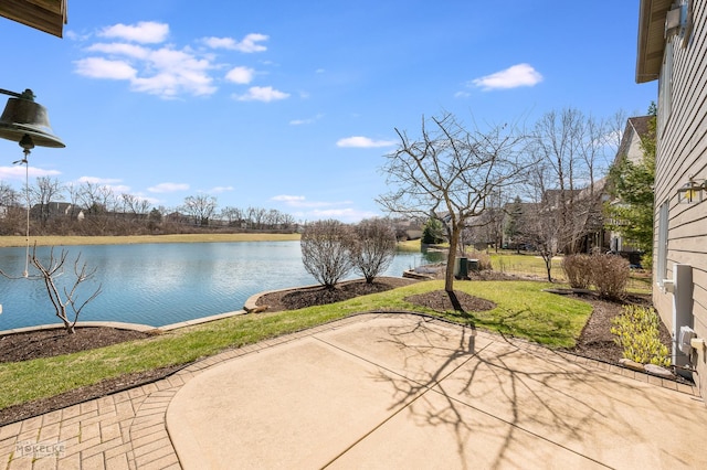 view of patio / terrace with a water view