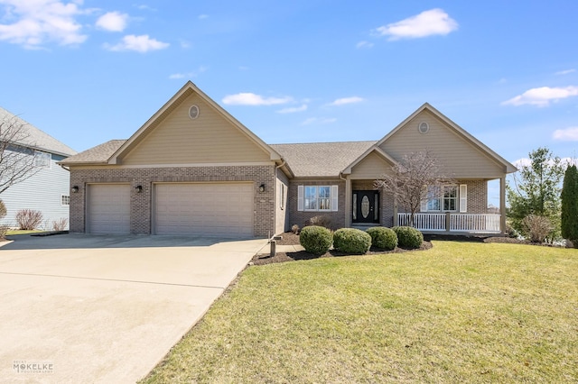 view of front facade featuring driveway, a front yard, covered porch, brick siding, and a garage