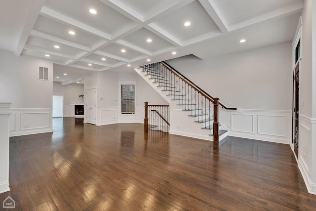 unfurnished living room featuring visible vents, recessed lighting, beam ceiling, and stairway