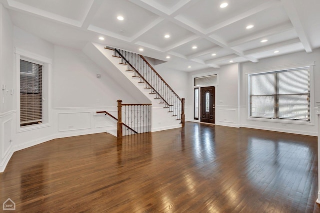 foyer featuring a decorative wall, beamed ceiling, recessed lighting, coffered ceiling, and hardwood / wood-style flooring