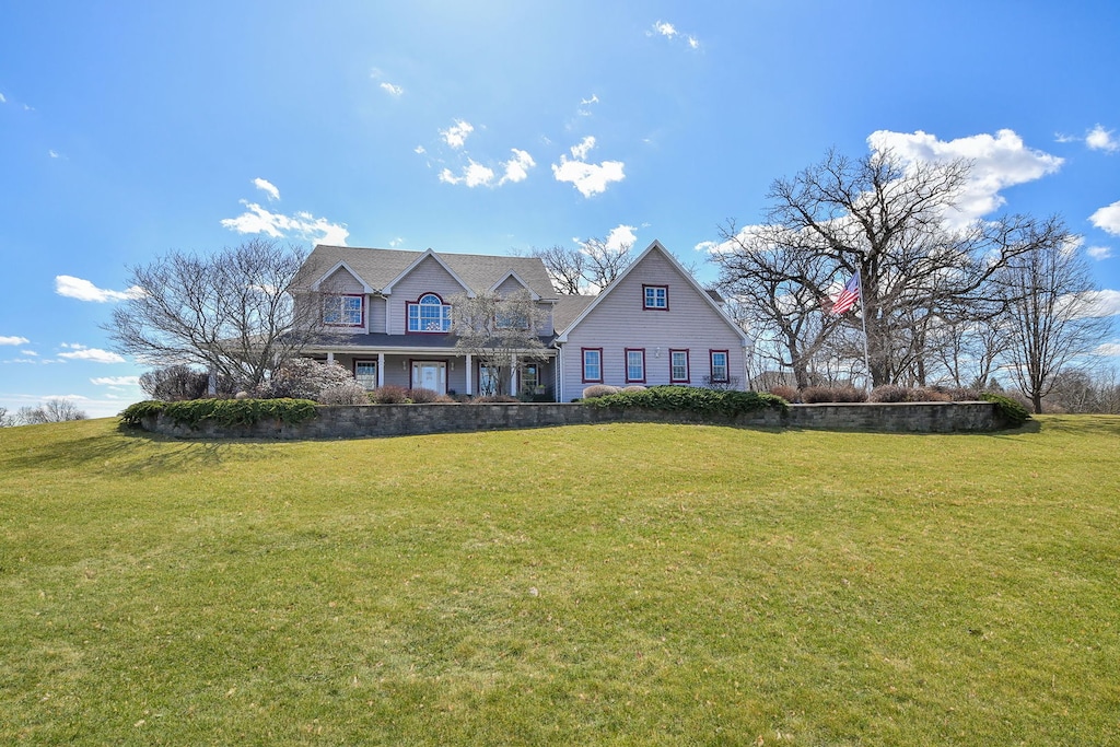 10N627 Oak Ridge Dr, Elgin, IL 60124 - view of front facade featuring a front lawn