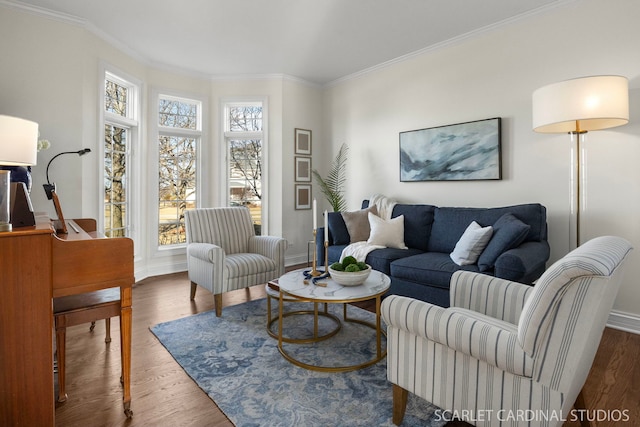 living area with dark wood-style flooring, ornamental molding, and baseboards