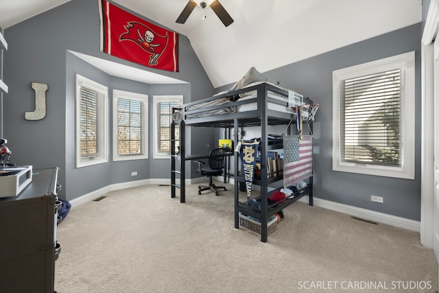 bedroom featuring carpet, multiple windows, lofted ceiling, and baseboards