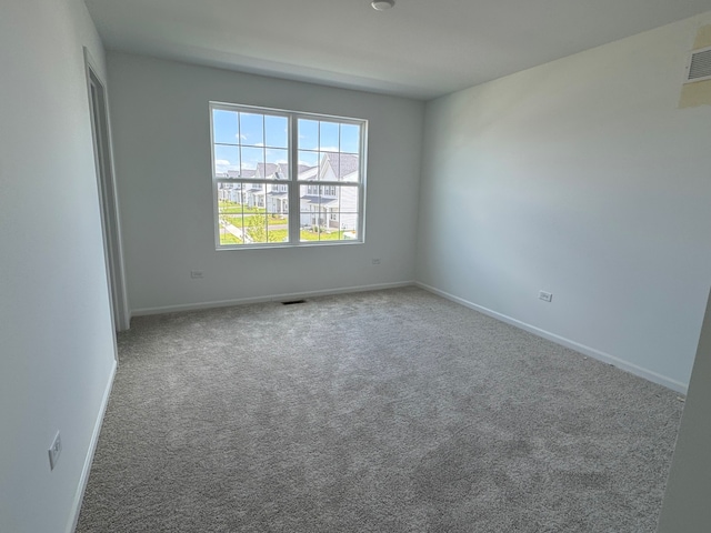 627 Henry Ln, Oswego, IL 60543 - unfurnished room featuring carpet and baseboards