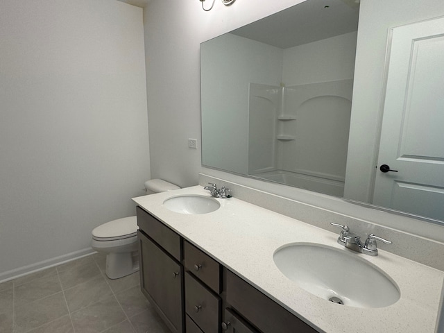627 Henry Ln, Oswego, IL 60543 - bathroom featuring double vanity, tile patterned floors, and shower / bath combination