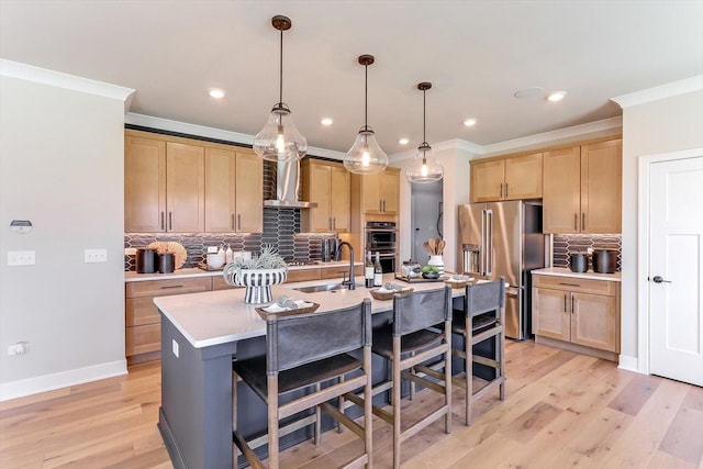 627 Henry Ln, Oswego, IL 60543 - kitchen with appliances with stainless steel finishes, wall chimney range hood, light brown cabinetry, backsplash, and ornamental molding