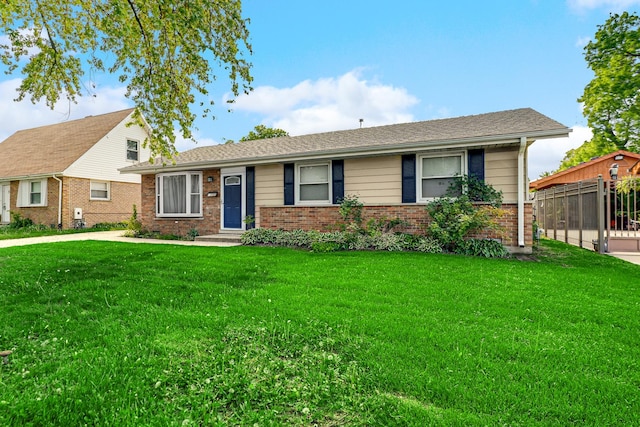 13000 W Playfield Dr, Crestwood, IL 60418 - view of front of house with brick siding and a front lawn