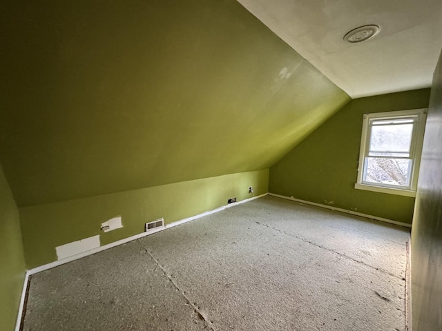 8216 S Brandon Ave, Chicago, IL 60617 - additional living space featuring visible vents and lofted ceiling