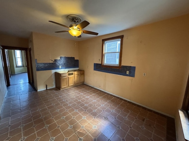 8216 S Brandon Ave, Chicago, IL 60617 - kitchen with baseboards and ceiling fan