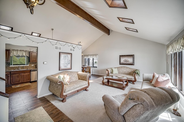living room with dark wood-style flooring, high vaulted ceiling, beamed ceiling, and baseboards