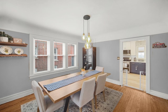 1739 Cedar Rd, Homewood, IL 60430 - dining area with baseboards and light wood-style floors