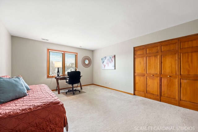 523 Ingalton Ave, West Chicago, IL 60185 - bedroom with baseboards, light colored carpet, and visible vents